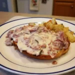 Creamed chipped beef served over golden toast with parsley garnish